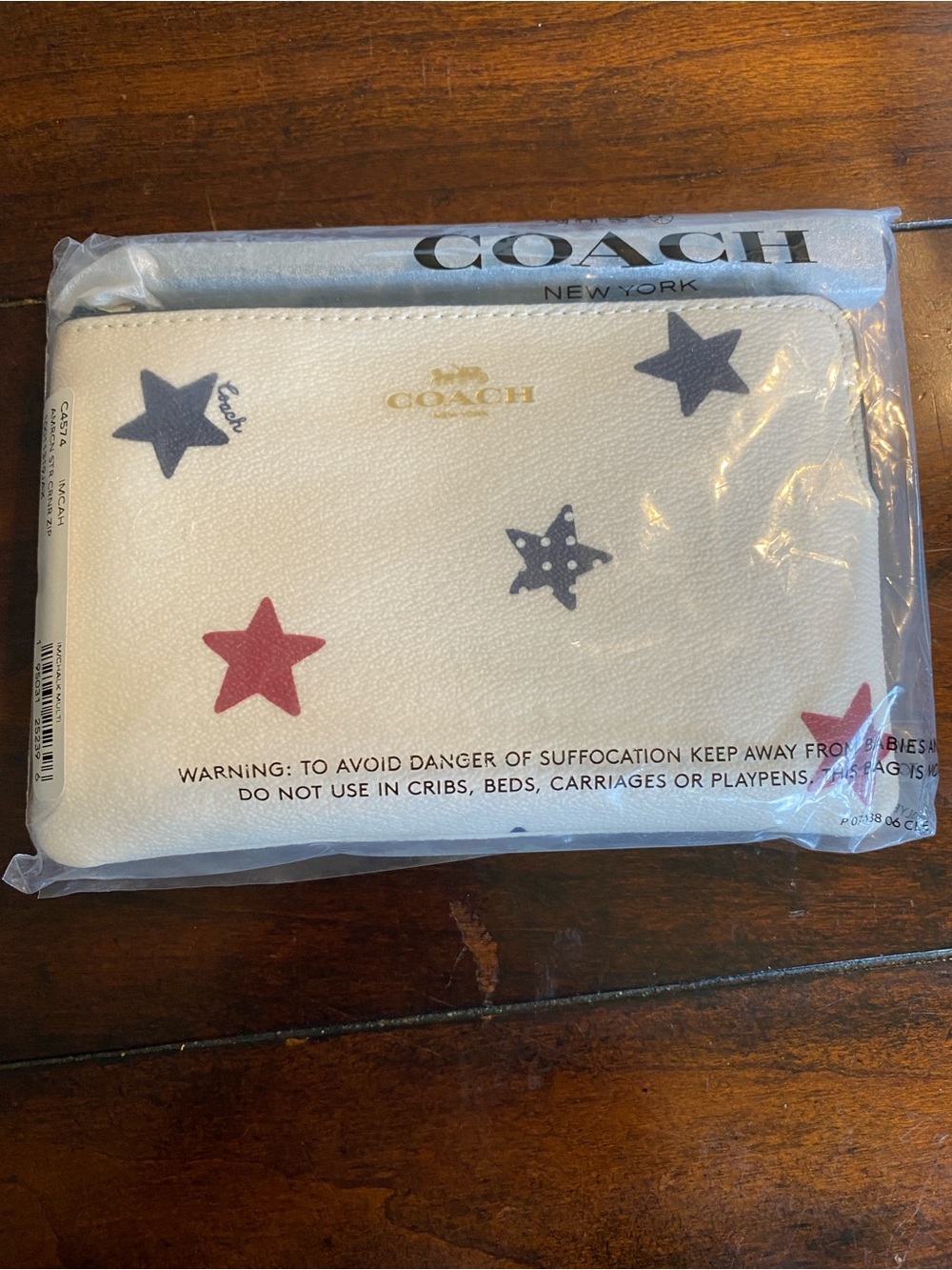 COACH White Leather Star Print Wristlet with Red & Navy Stars